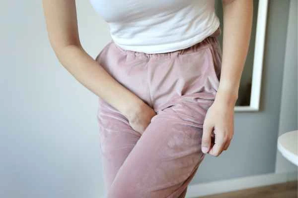 woman running for the toilet because of urinary incontinence Sutton on Trent